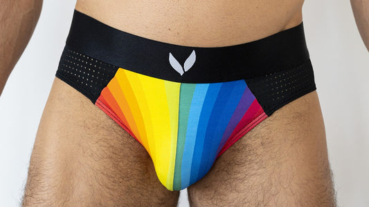 Rainbow-colored Bunnies Underwear men's mesh briefs with a black waistband and logo.
